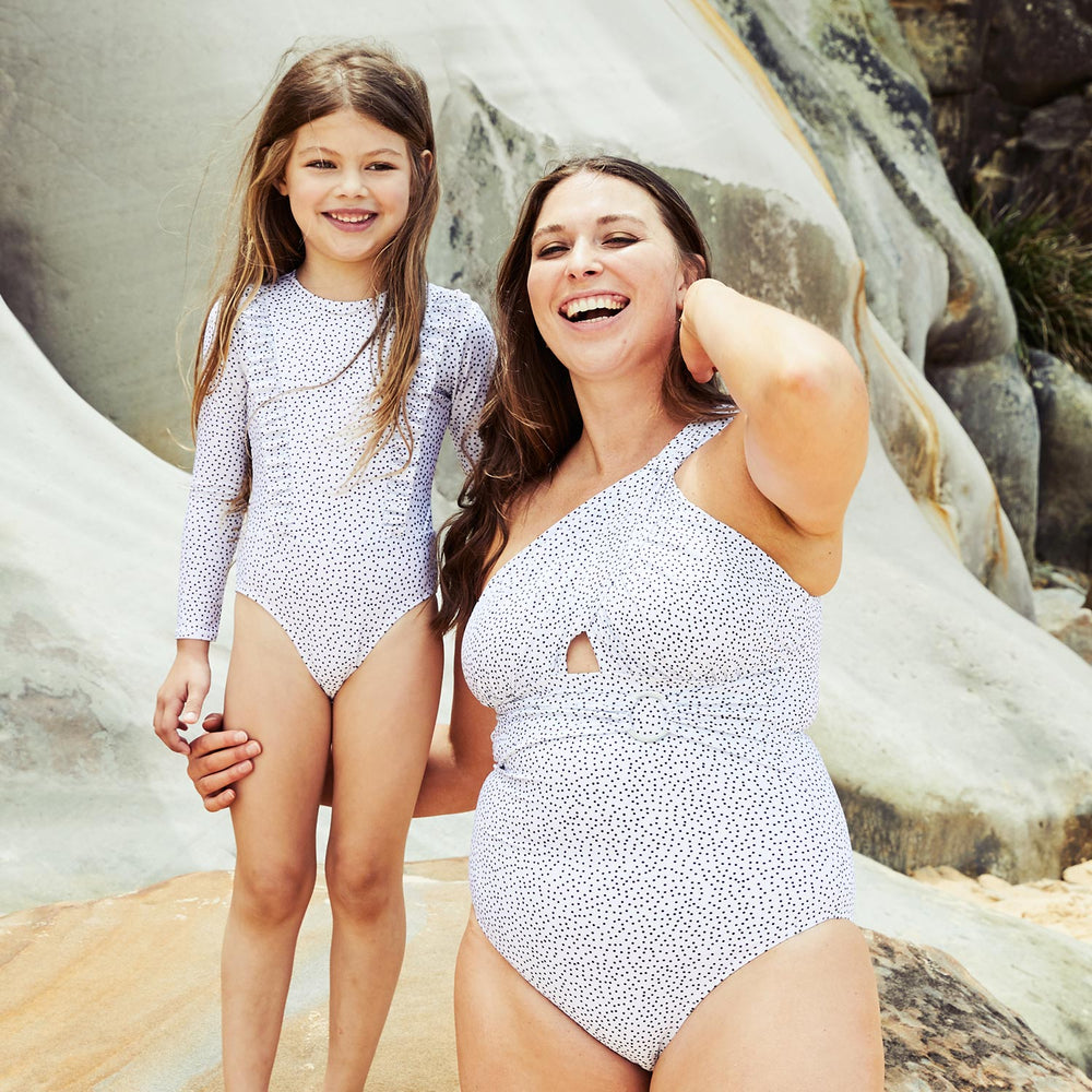Little-Halle-surfsuit-long-sleeve-and-Angelica-one-piece-dots-white-new-contessa-volpi-swimwea